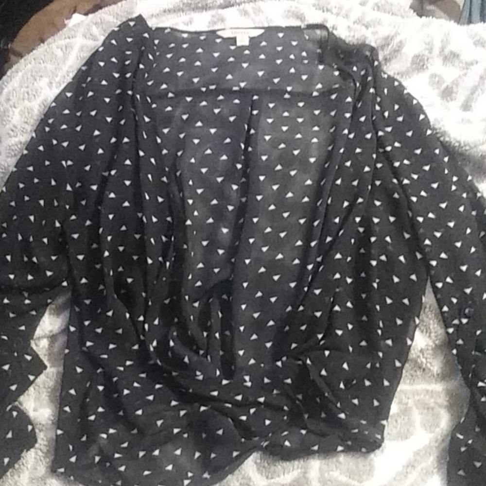 Black with white triangle overlay